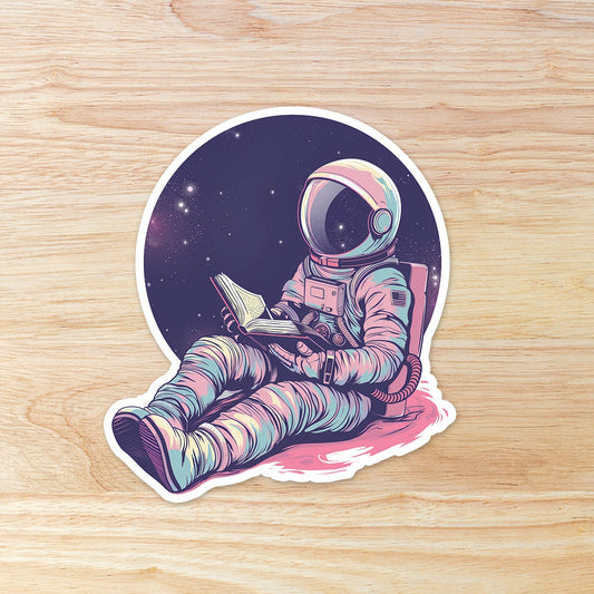 Astronaut Reading a Book in Space: Waterproof Vinyl Sticker